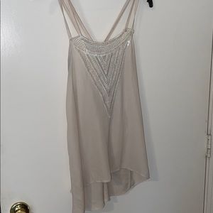 High-low cross back day trip blouse